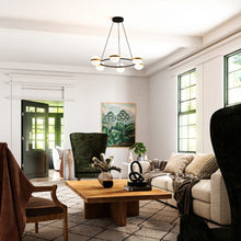 Load image into Gallery viewer, Tagliato LED Ring Chandelier in living room.
