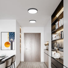 Load image into Gallery viewer, Adelaide LED Flush Mount Ceiling Light in living room.
