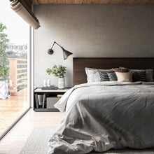 Load image into Gallery viewer, Archer Adjustable Wall Light in bedroom.
