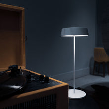 Load image into Gallery viewer, Alessandro Volta LED Portable Battery Table Lamp in living room.
