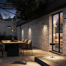 Load image into Gallery viewer, Alessandro Volta LED Portable Battery Table Lamp in Outside Area.
