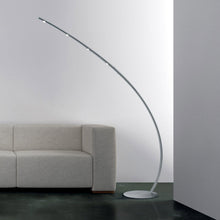 Load image into Gallery viewer, Columbus LED Arch Floor Lamp in living room.
