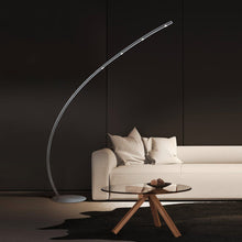 Load image into Gallery viewer, Columbus LED Arch Floor Lamp in living room.
