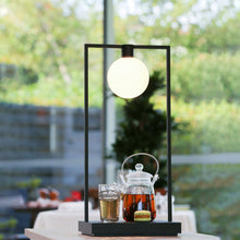 Load image into Gallery viewer, Curiosity LED Table Lamp in living room.
