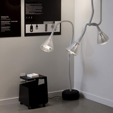 Load image into Gallery viewer, Pipe LED Floor Lamp in living room.
