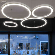 Load image into Gallery viewer, Ripple LED Pendant Light in store.
