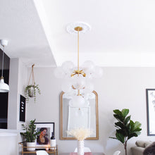 Load image into Gallery viewer, Ashleigh LED Chandelier in living room.
