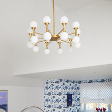 Load image into Gallery viewer, Astoria LED Chandelier in living room.
