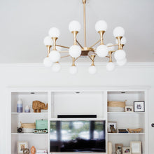 Load image into Gallery viewer, Astoria LED Chandelier in living room.
