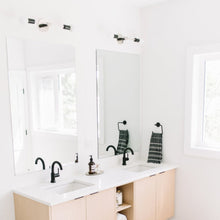 Load image into Gallery viewer, Astrid Wall Light in bathroom.
