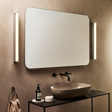 Load image into Gallery viewer, Artemis LED Vanity Wall Light in bathroom.
