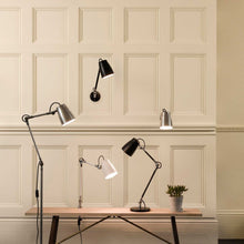 Load image into Gallery viewer, Atelier Grande Wall Light in living room.
