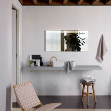 Load image into Gallery viewer, Avlon LED Illuminated Mirror in bathroom.
