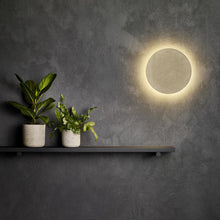 Load image into Gallery viewer, Eclipse Concrete LED Wall Light in living room.
