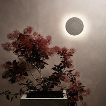 Load image into Gallery viewer, Eclipse Concrete LED Wall Light in living room.
