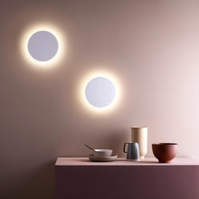 Load image into Gallery viewer, Eclipse LED Wall Light in living room.
