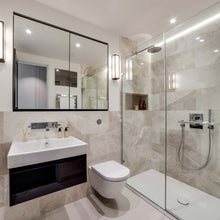 Load image into Gallery viewer, Mashiko Square Wall Light in bathroom.
