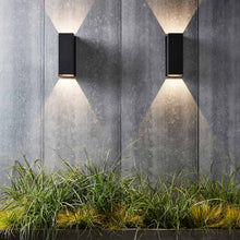 Load image into Gallery viewer, Oslo Outdoor LED Wall Light in Outside area.
