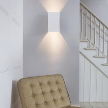 Load image into Gallery viewer, Rio LED Wall Light in living room.
