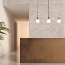 Load image into Gallery viewer, Tacoma LED Pendant Light in living room.
