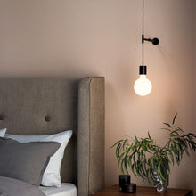 Load image into Gallery viewer, Tacoma LED Pendant Light With Wall Kit in bedroom.
