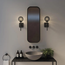 Load image into Gallery viewer, Tacoma Wall Light in bathroom.
