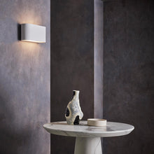 Load image into Gallery viewer, Velo LED Wall Light in living room.
