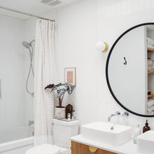Load image into Gallery viewer, Baird LED Bathroom Wall Light in bathroom.
