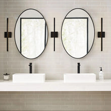 Load image into Gallery viewer, Banda LED Bath Wall Light in bathroom.
