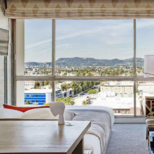 Load image into Gallery viewer, Binic LED Table Lamp in bedroom.
