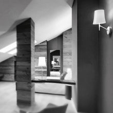 Load image into Gallery viewer, Birdie Wall Light in living room.
