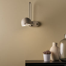 Load image into Gallery viewer, Bowee LED Adjustable Wall Light in living room.
