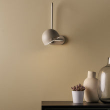 Load image into Gallery viewer, Bowee LED Adjustable Wall Light in living room.
