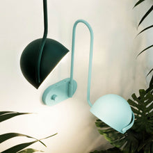 Load image into Gallery viewer, Bowee LED Adjustable Wall Light in living room.
