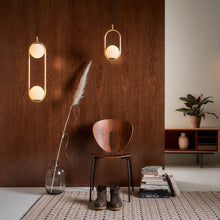 Load image into Gallery viewer, C_Ball S2 Pendant Light in living room.
