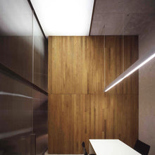 Load image into Gallery viewer, Marc S LED Linear Pendant Light in office.
