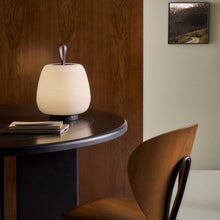 Load image into Gallery viewer, Misko Camp LED Table Lamp in living room.
