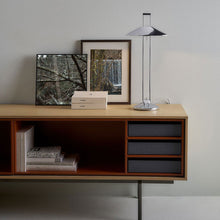 Load image into Gallery viewer, Regina T Table Lamp in living room.

