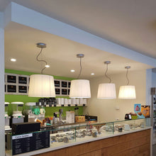 Load image into Gallery viewer, Royal S Pendant Light in restaurant.
