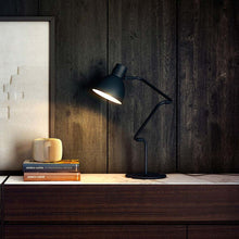 Load image into Gallery viewer, Blux System T Table Lamp in living room.
