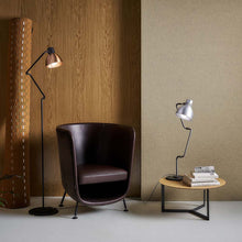 Load image into Gallery viewer, Blux System T Table Lamp in living room.

