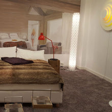 Load image into Gallery viewer, Blux System T Table Lamp in bedroom.
