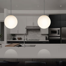 Load image into Gallery viewer, Bola Sphere LED Pendant Light in kitchen.
