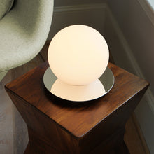 Load image into Gallery viewer, Bola Sphere LED Table Lamp in living room.
