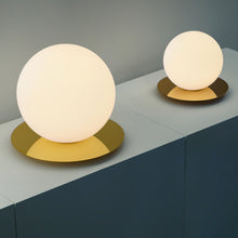 Load image into Gallery viewer, Bola Sphere LED Table Lamp in exhibition.
