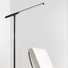 Load image into Gallery viewer, Brazo LED Floor Lamp in living room.
