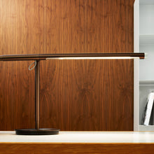 Load image into Gallery viewer, Brazo LED Table Lamp in living room.
