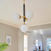 Load image into Gallery viewer, Brielle 4-Light Pendant Light in living room.
