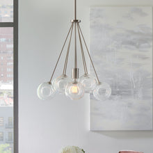 Load image into Gallery viewer, Bronzeville Pendant Light in living room.
