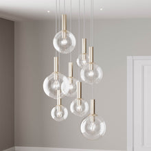 Load image into Gallery viewer, Bubbles Multi Light Pendant Light in living room.
